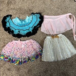 Bundle of dance skirts and wrap around. Different brands and size range 4-6